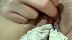 Watch this close-up panty stuffing and wet fingering