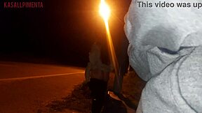 young woman shows her ass to a stranger at the bus stop