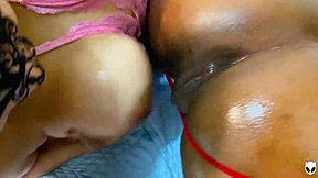 two lesbians rub oiled nipples on wet pussies