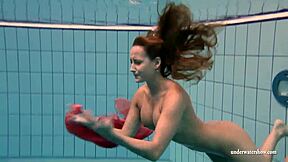 Big Tits Silvie Swims in Bikini Showing Hairy Pussy Underwater