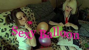 Watch these sexy teens pop balloons and kiss passionately!