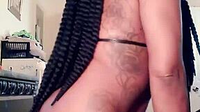 Petite ebony beauty dances seductively to vintage tunes