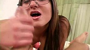 nicole, the spex slut, strips and tugs hard cock for a messy cumshot.