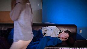 Danni and Rion cuddle under blanket