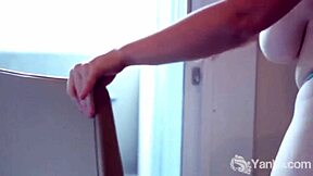 redhead reaches orgasm through fingering and masturbation