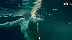 Lozhkova in see-through shorts by the pool