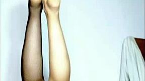 Watch this young girl give a footjob massage