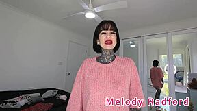 Melody Radford tries on short black and red lingerie skirt in closeup haul.