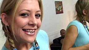 Does Leah with braces love two big cocks?