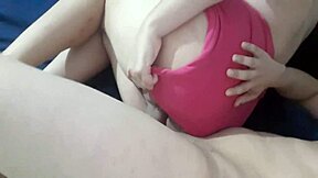 My neighbor in pink shorts poses sideways in her homemade video