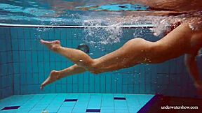 Is Deniska, the Big Tits Petite Babe, Swimming in the Pool for Underwater Fun?