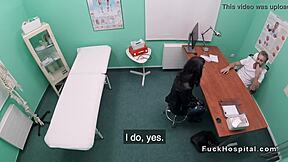 Doctor interacts with petite patient in a fake hospital environment