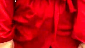 brunette in red lingerie plays with her big tits