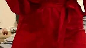 brunette in red lingerie plays with her big tits