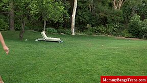 blonde milf spends outdoor time with stepson.