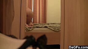 young blonde performs striptease and masturbates in front of mirror