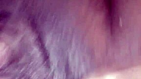 Young ebony teen fingers her wet pussy open