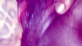 Young ebony teen fingers her wet pussy open