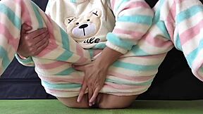 Teen in pajamas intensely masturbates her small tits and pussy to squirting orgasm