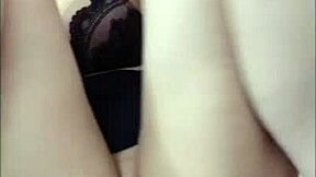 Amateur Japanese girl masturbates with big tits and ass on display.