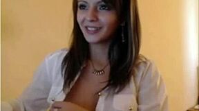 Hey, check out this beautiful camgirl teasing with her big tits and ass 😍