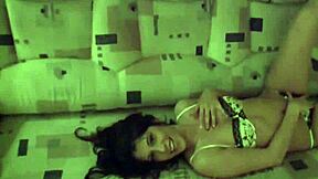 This video shows a sexy brunette teen stripping from lingerie to nude for a blowjob