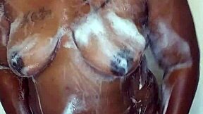 ebony wife enjoys fetish massage in bath with milf