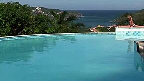 gorgeous blonde enjoys outdoor fun by the pool