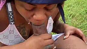 Girl sucks big black cock for pocket change.