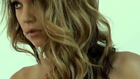 Ali Rose, the naughty brunette, rips off her clothes in a seductive striptease, revealing her amazing naked body.