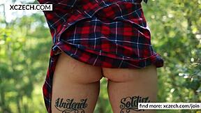 chubby country girl teases with natural tits and tattooed body