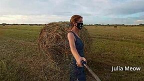 juli smith meow slowly undresses in the outdoor field for voyeurs