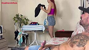 Maid ironing clothes while boss eyes her naughty moves.