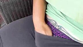 Young girl plays with her feet playfully