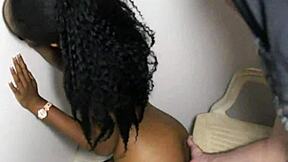 ebony hottie blows strangers through glory hole.