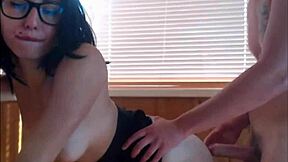 young babe in glasses enjoys facial cumshot