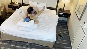 The tattooed beauty is giving a blowjob to her partner.