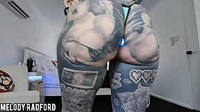 The milf tries on a bikini while wearing an LED butt plug. She looks stunning in the homemade setting