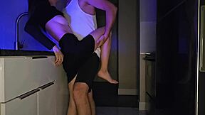 Amateur teen brunette with a tight body moans softly in the kitchen setting.