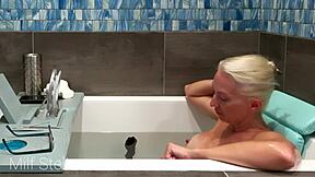Bathing with MILF Stella in episode 1. Her huge shaved pussy and body shaving are just mesmerizing.