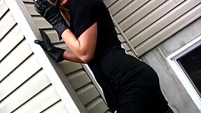 My sexy girlfriend teases outside in lingerie while smoking.