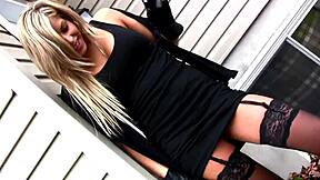 My sexy girlfriend teases outside in lingerie while smoking.