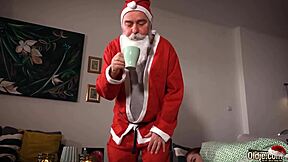 santa visits a pretty redhead for christmas fun