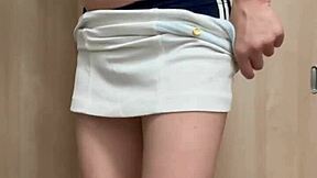 Girls in tennis costumes tease their asses playfully