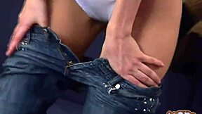 Tight teen Alex strips off her skinny jeans slowly.