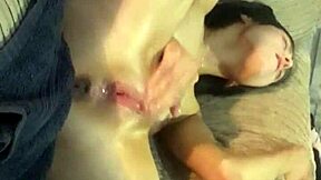 I watch the petite teen oil her tight ass and squirt.