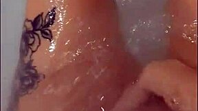 Pretty woman masturbates in hot tub, loud cumshot finale