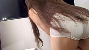 Exhibitionist maid shows huge cameltoe and ass on camera! 🔥