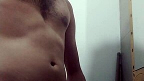 young woman undresses in bathroom for solo session