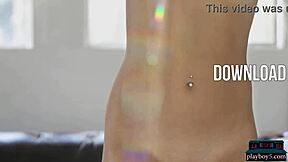 Russian beauty Nicole Winter strips solo for Playboy.